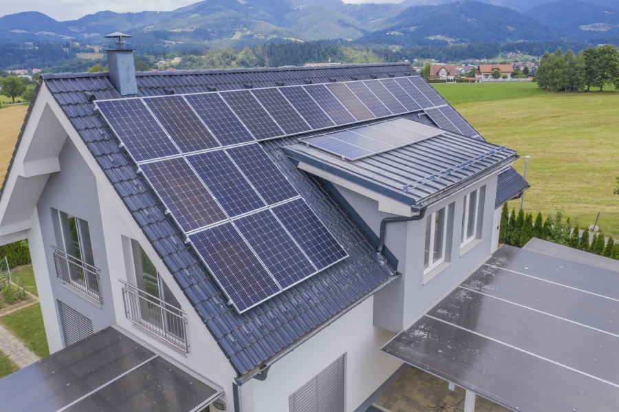 aerial-view-of-a-private-house-with-solar-panels-on-the-roof